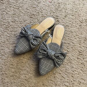 Isaac Mizrahi New York plaid mules featuring a decorative bow